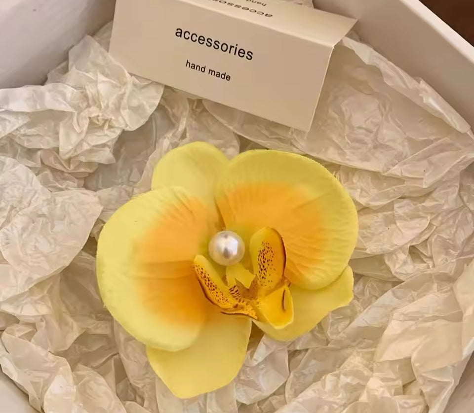 Pinza orquídea