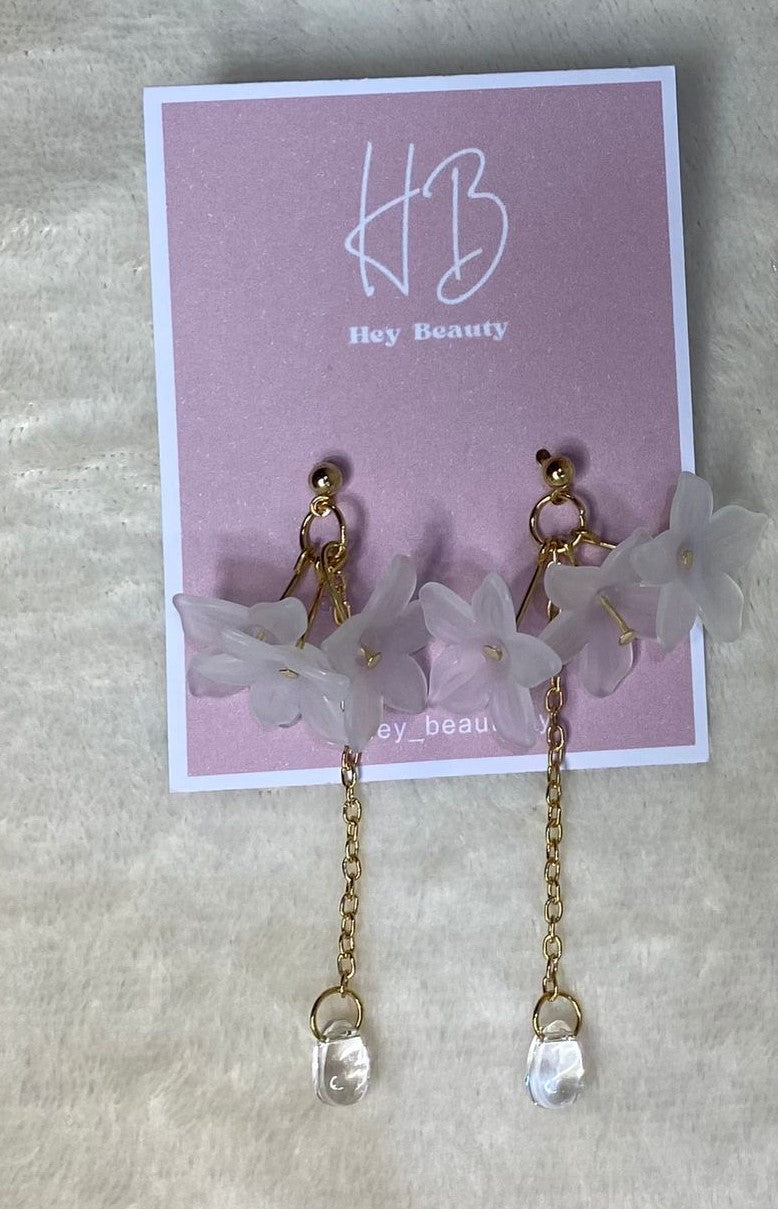 Caravanas largas con flores
