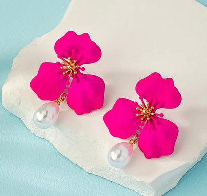 Caravanas flor fucsia