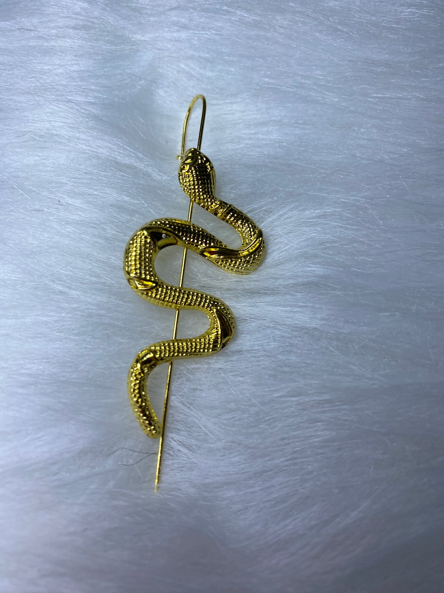Gancho con serpiente