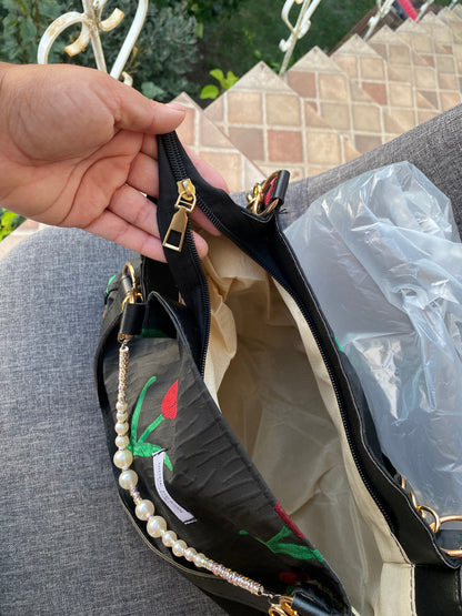 Bolso floral negro