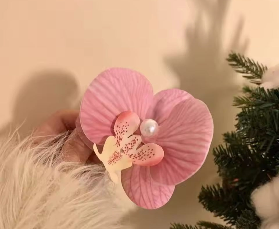 Pinza orquídea