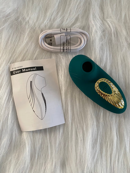 Vibrador succionador