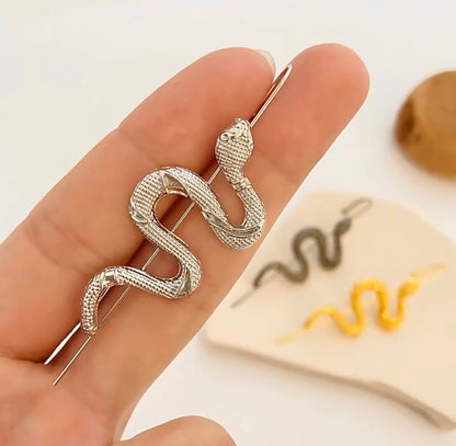 Gancho con serpiente