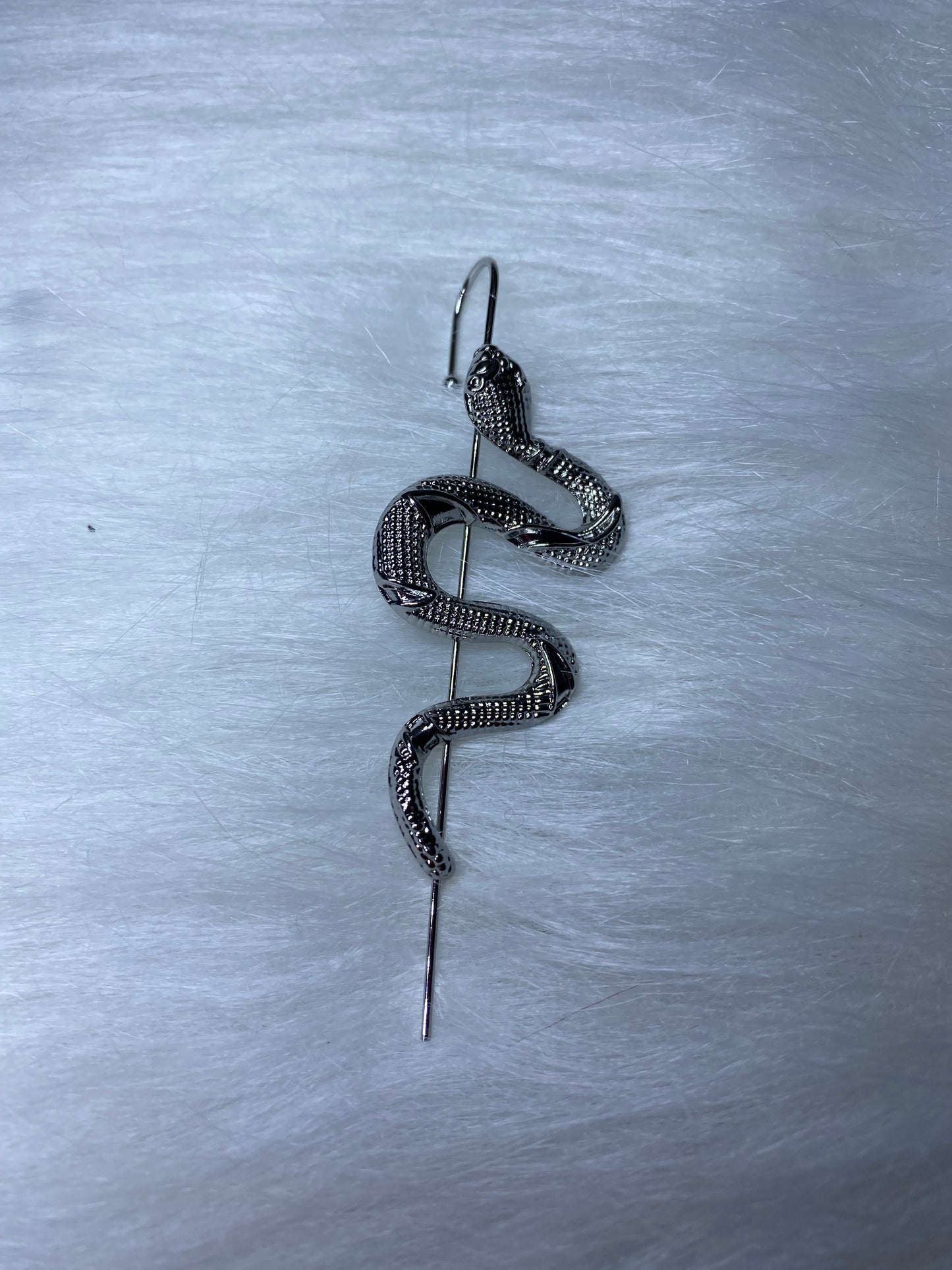 Gancho con serpiente