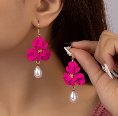 Caravanas flor fucsia