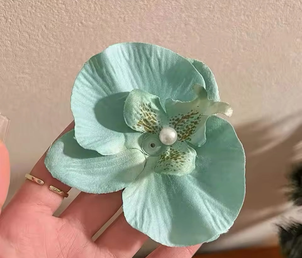 Pinza orquídea
