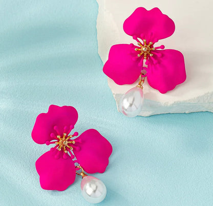 Caravanas flor fucsia