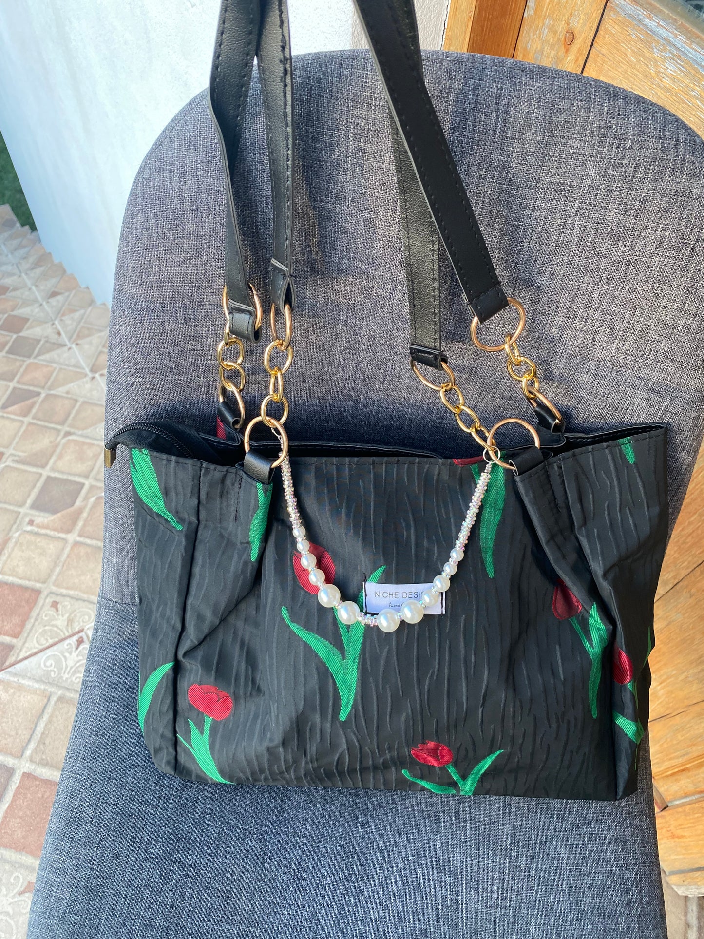 Bolso floral negro