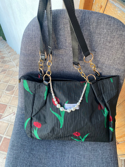 Bolso floral negro