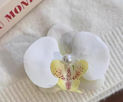 Pinza orquídea