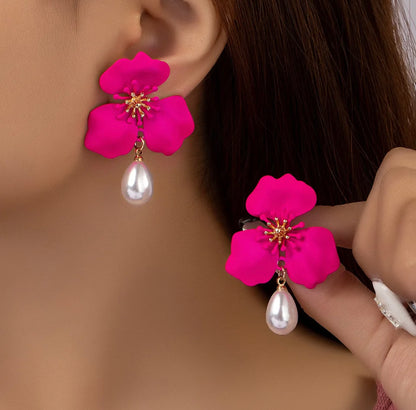 Caravanas flor fucsia