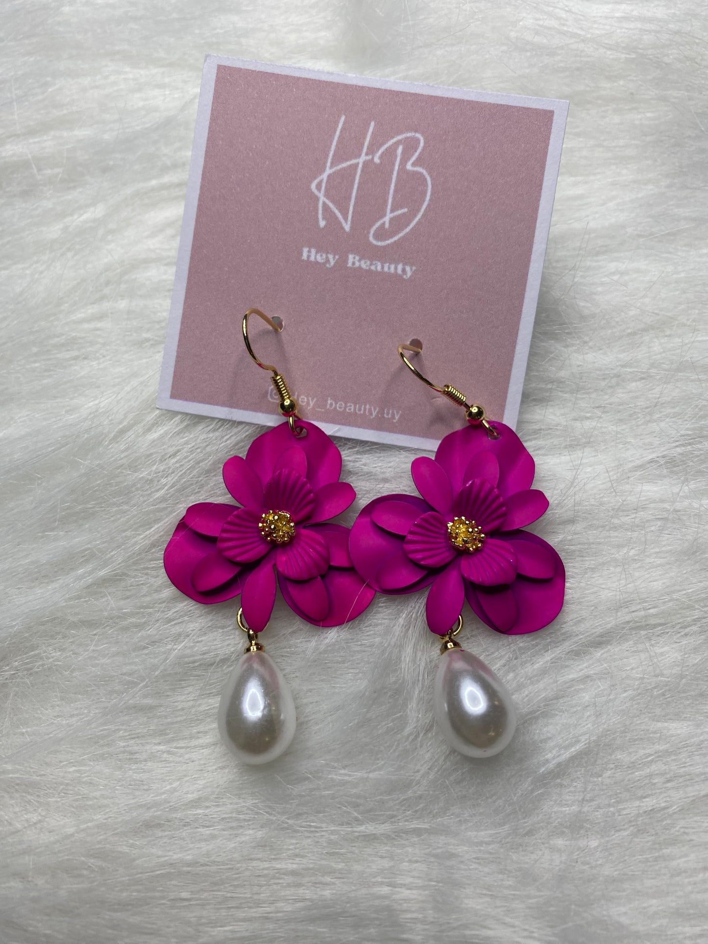Caravanas flor fucsia